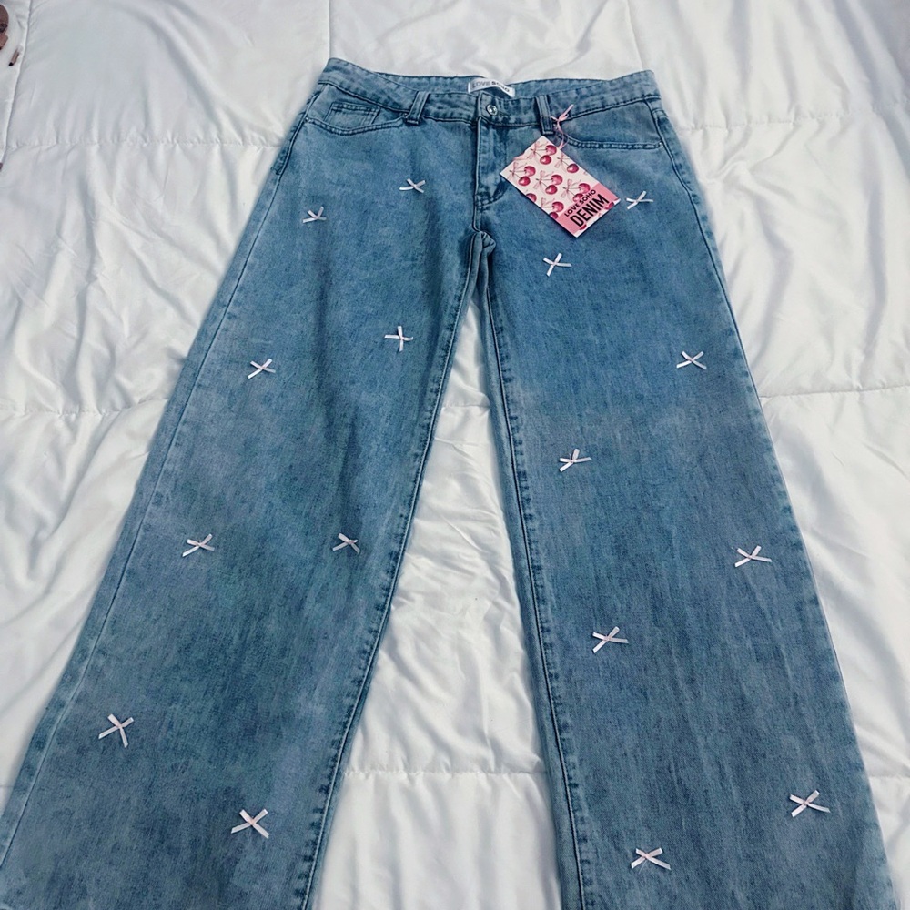 Wide Leg Blue Jeans with Pink Bow Accents